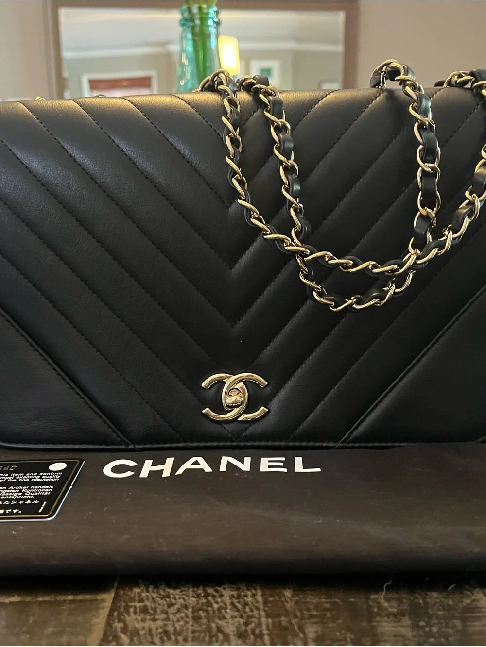 CHANEL Black Chevron Quilted Leather Shoulder Bag with Gold Chain